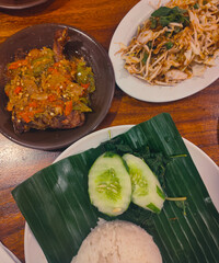 Fried duck with typical Indonesian chili sauce, served with vegetables
