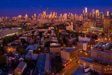 Chicago cityscape at twilight, vibrant colors, urban architecture. Aerial view of buildings, streets, and the city skyline. River West, Chicago, Illinois, United States