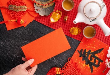 Fototapeta premium Red envelopes and ornaments and knick-knacks for the Lively Chinese New Year, Chinese New Year Celebration, Chinese New Year Decorations
