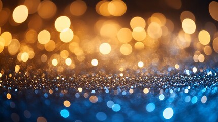Abstract blue and gold background with sparkling bokeh, festive new year's eve atmosphere