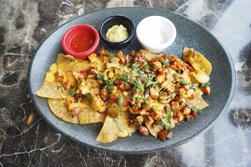 Corn chips nachos with fried minced meat