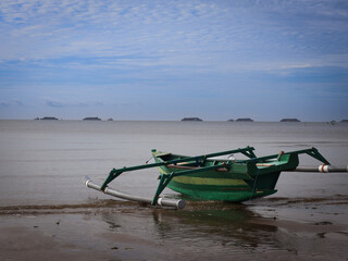 Wooden boat on the beach, Fishing boats on the shore of the White Sea  on a bright sunny day.