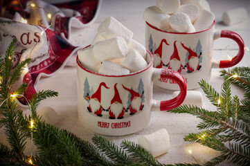 marshmallows in New Year's mugs, festive atmosphere
