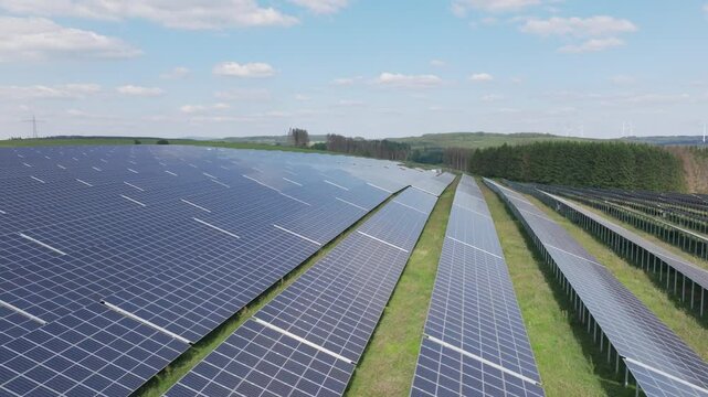Wideangle droneshot of a huge solarpark in rural Germany