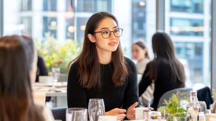 Young woman wearing glasses in a busy urban setting, standing near informational displays. Concept: exploration, curiosity.