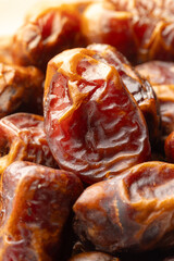Heap of dried dates fruit. Close-up