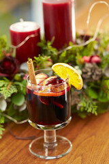 Warm wine with lemon in a cup