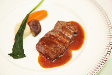 Steak with sauce on a plate