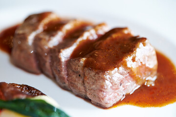 Steak with sauce on a plate