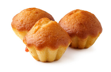 Delicious freshly baked muffins arranged neatly on a white surface in a bright kitchen setting