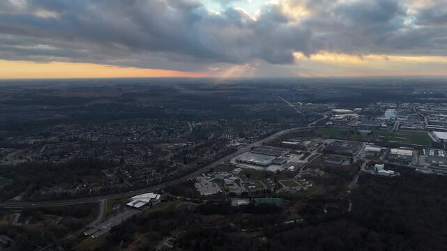 The city of Kitchener, Ontario nestled under a serene blanket of clouds at sunset time in Canada