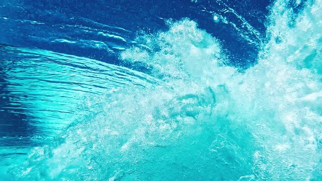Underwater view of ocean wave breaking in the Maldives