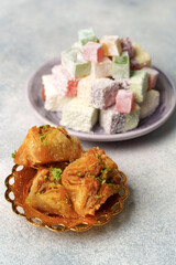 Traditional Turkish desserts featuring baklava and Turkish delight served on elegant dishes