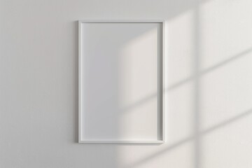 Photo frame and diploma mockups on white wall background.