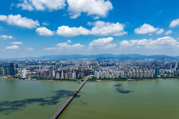 Fototapeta premium Blue sky and white clouds city skyline aerial photography
