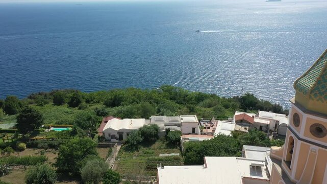 Aerial view of Praiano coastline and Parish Church of Saint Januarius on a sunny summer day, Amalfi Coast Italy, Europe