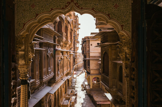 Street in the old town with ancient buildings Jaisalmer, Rajasthan, India