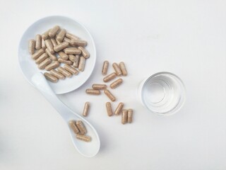 Capsules on white background. Top of view. 