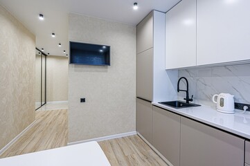 interior apartment kitchen and dining room, refectory area, cooking equipment, table furniture, stove