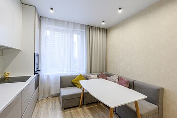 interior apartment kitchen and dining room, refectory area, cooking equipment, table furniture, stove