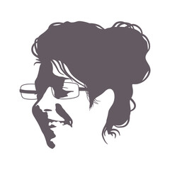 Silhouette of a female head. Beauty and fashion. Elegant silhouette of a young woman wearing spectacles