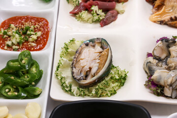 Korean seafood. Fresh abalone sashimi