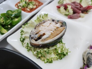 Korean seafood. Fresh abalone sashimi