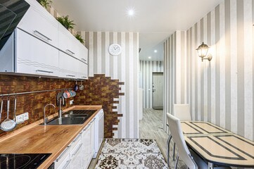 interior apartment kitchen and dining room, refectory area, cooking equipment, table furniture, stove