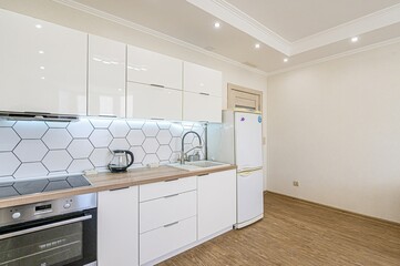 interior apartment kitchen and dining room, refectory area, cooking equipment, table furniture, stove