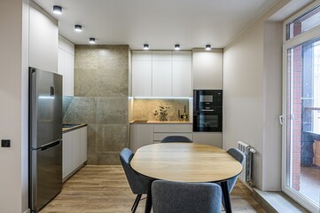 interior apartment kitchen and dining room, refectory area, cooking equipment, table furniture, stove