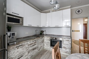 interior apartment kitchen and dining room, refectory area, cooking equipment, table furniture, stove