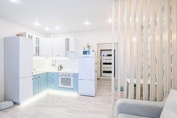 interior apartment kitchen and dining room, refectory area, cooking equipment, table furniture, stove