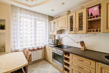 interior apartment kitchen and dining room, refectory area, cooking equipment, table furniture, stove