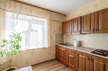 interior apartment kitchen and dining room, refectory area, cooking equipment, table furniture, stove