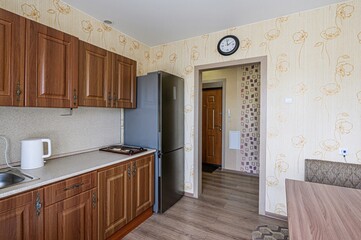 interior apartment kitchen and dining room, refectory area, cooking equipment, table furniture, stove