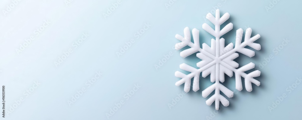 Poster snowflake abstract background idea. a beautiful snowflake on a soft blue background, symbolizing win