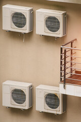 Energy-efficient heat pump on house wall