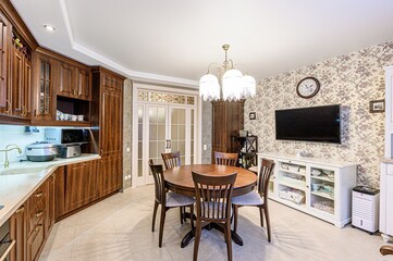 interior apartment kitchen and dining room, refectory area, cooking equipment, table furniture, stove