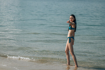Young woman in walking on seaside