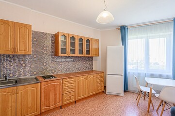 interior apartment kitchen and dining room, refectory area, cooking equipment, table furniture, stove