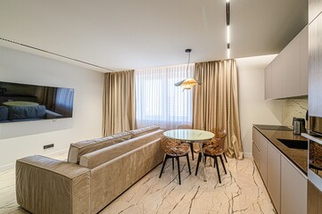 interior apartment kitchen and dining room, refectory area, cooking equipment, table furniture, stove