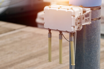 Network equipment mounted on metal post