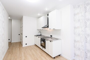 interior apartment kitchen and dining room, refectory area, cooking equipment, table furniture, stove