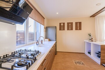 interior apartment kitchen and dining room, refectory area, cooking equipment, table furniture, stove