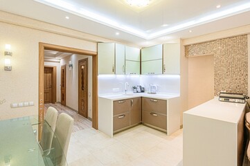 interior apartment kitchen and dining room, refectory area, cooking equipment, table furniture, stove