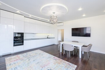 interior apartment kitchen and dining room, refectory area, cooking equipment, table furniture, stove