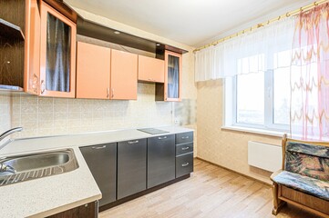 interior apartment kitchen and dining room, refectory area, cooking equipment, table furniture, stove
