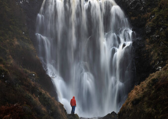 A single lone person at Clashnessie Falls, Larig, Northwest west Scotland.
