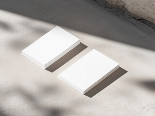 Two white business card mock up on concrete