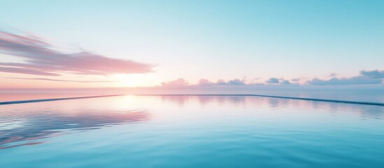 Obraz premium Calm tranquil water reflecting a serene sunrise.